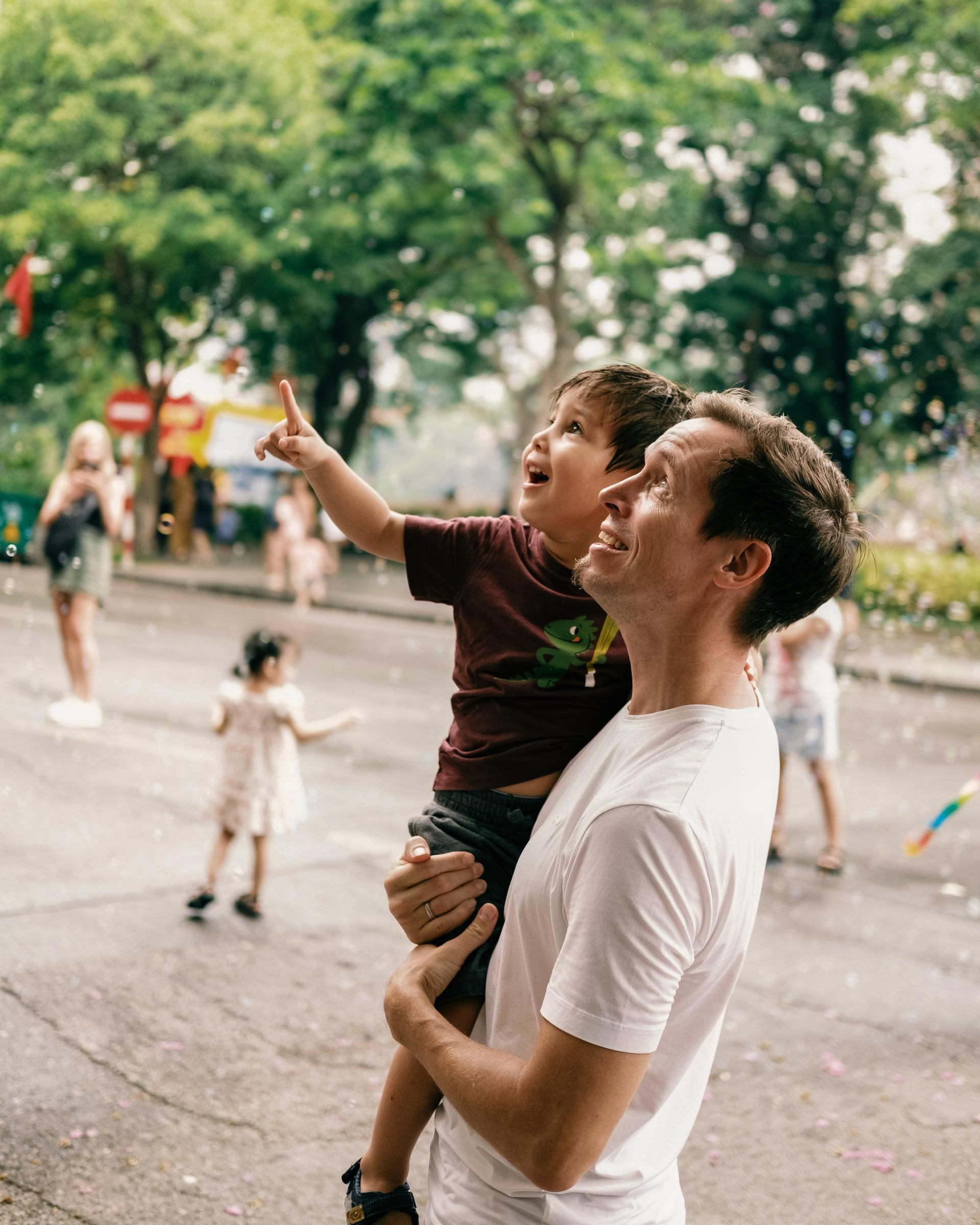 A man carrying a child
